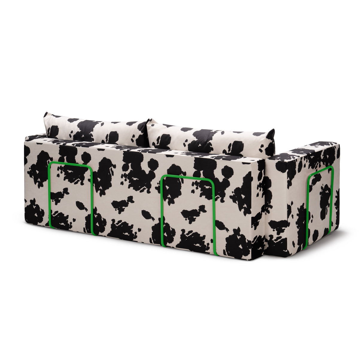 Flow Cow sofa bed in black-and-white cow print fabric with a green metal frame, back view