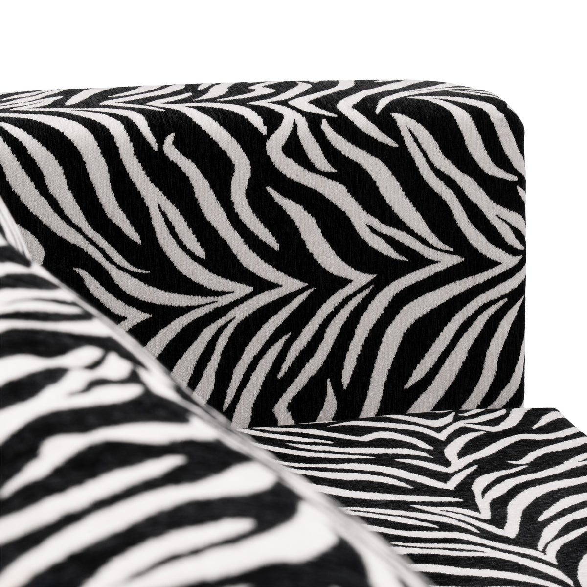 Flow Zebra sovesofa i sort-hvidt zebramønster med rødt metalstel, nærbillede af sæde og armlæn
